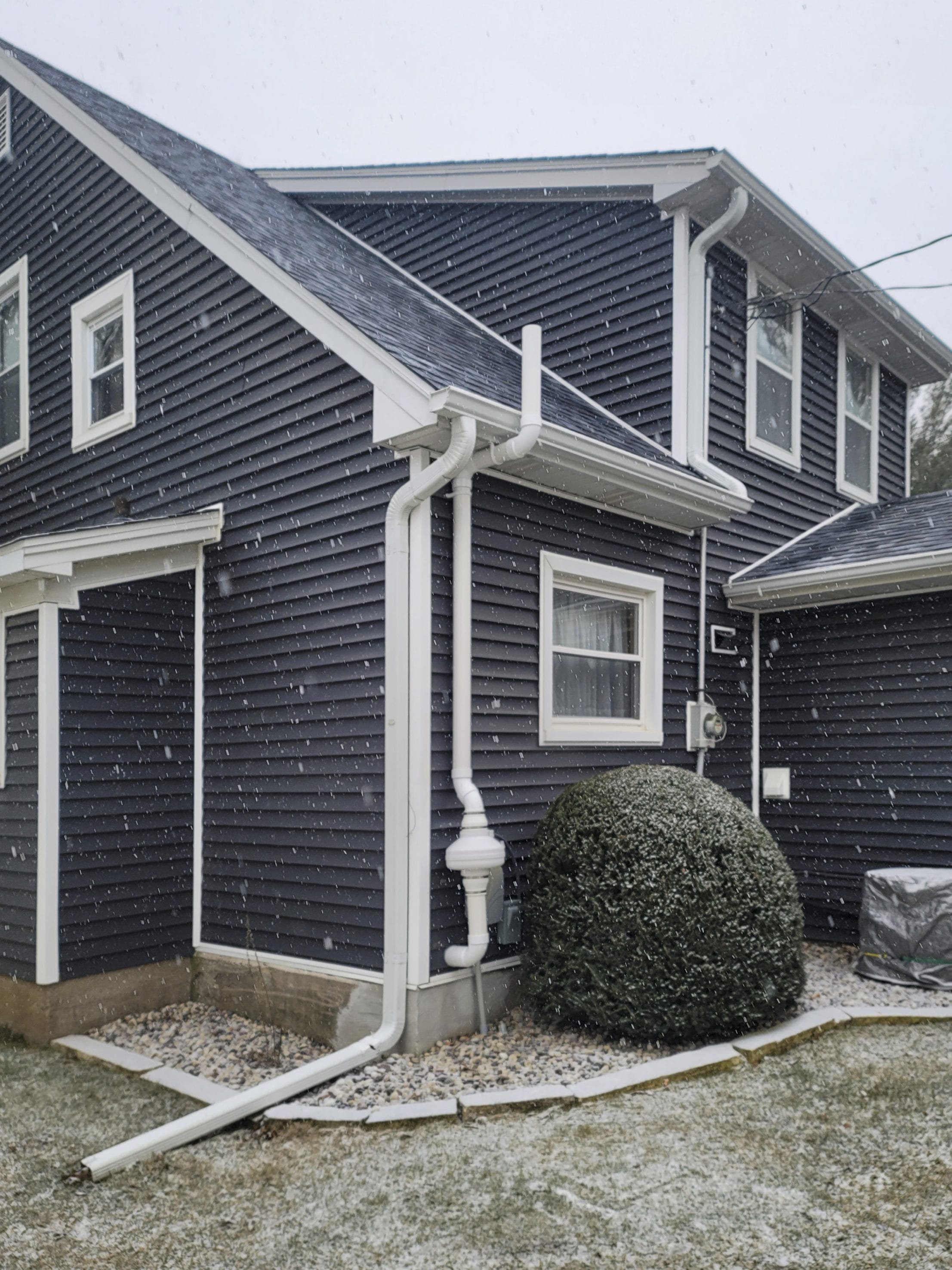 A radon mitigation system installed in Iowa by Adios Radon