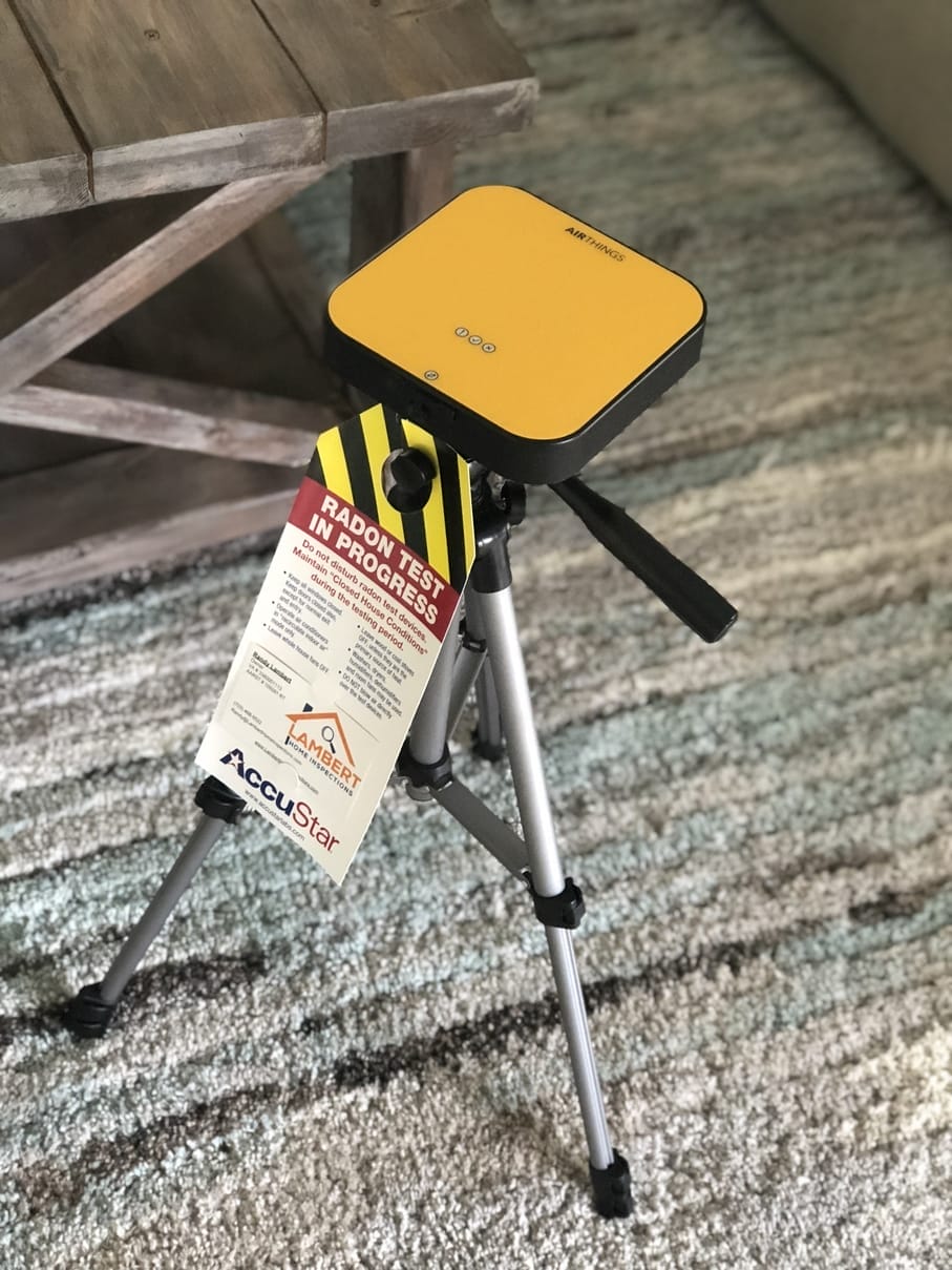 Radon testing equipment setup in a home environment